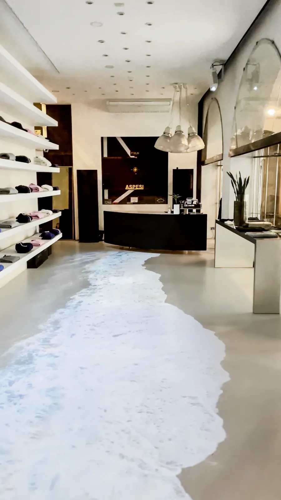 Waves projected onto a boutique floor
